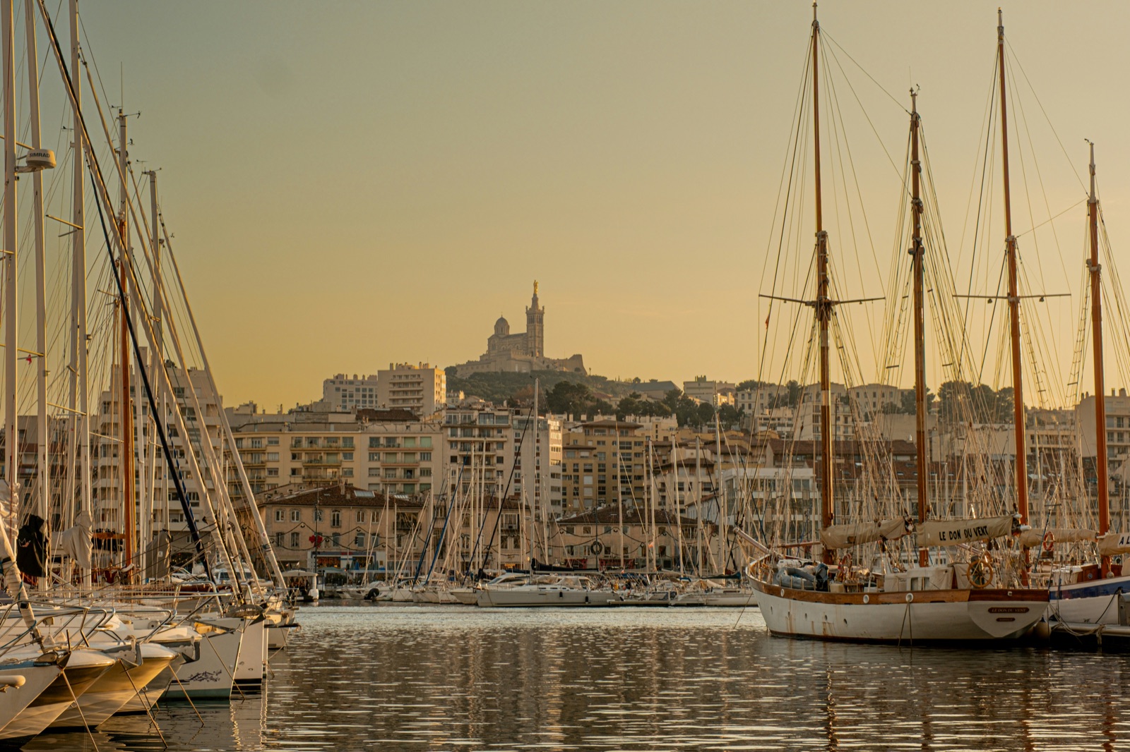 The Vieux-Port at dusk, Notre-Dame de la Garde above